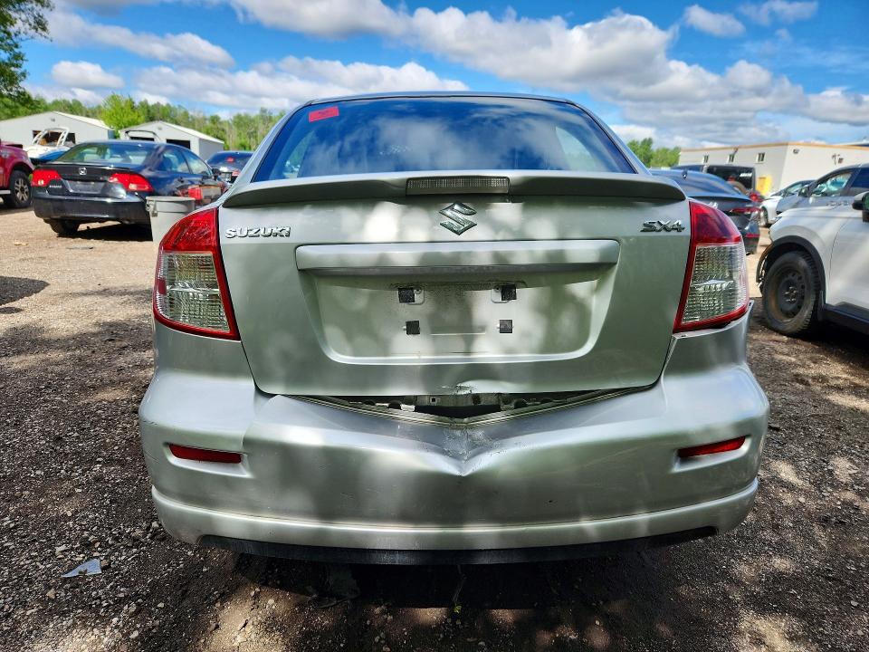 56576496 :رقم المزاد ، JS2YC5A91A6300039 vin ، 2010 Suzuki Sx4 مزاد بيع