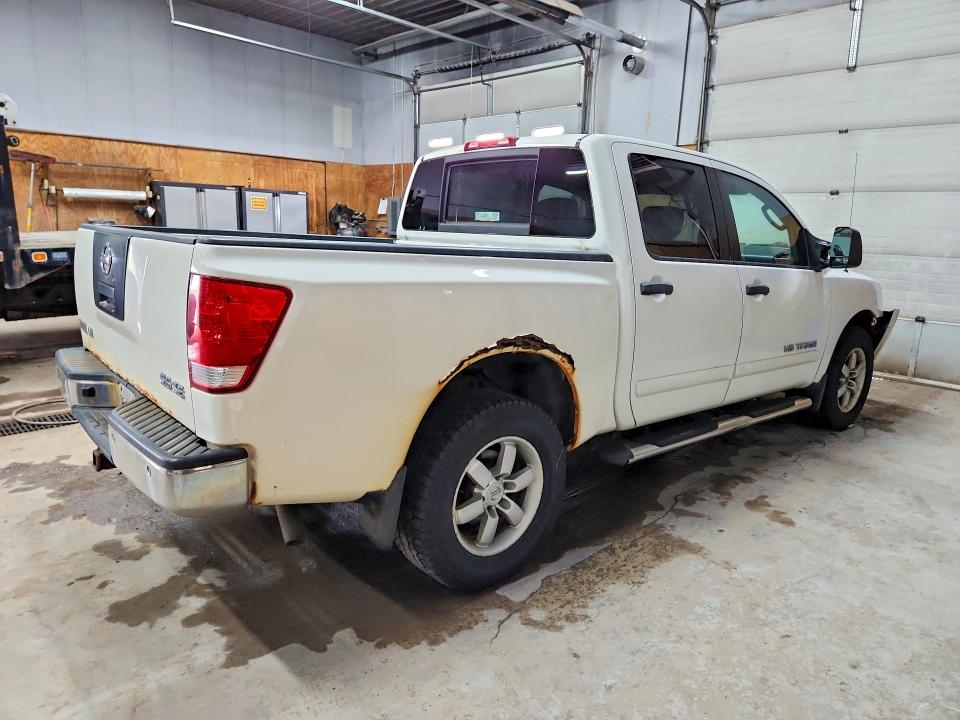 57263776 :رقم المزاد ، 1N6AA0EC2AN304324 vin ، 2010 Nissan Titan مزاد بيع