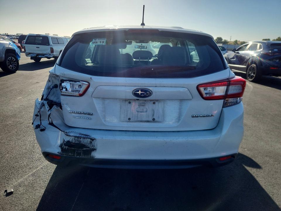 59141476 :رقم المزاد ، 4S3GTAA64J3707083 vin ، 2018 Subaru Impreza مزاد بيع