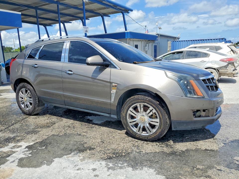 Продажа на аукционе авто 2012 Cadillac Srx, vin: 3GYFNAE36CS620556, номер лота: 57053616