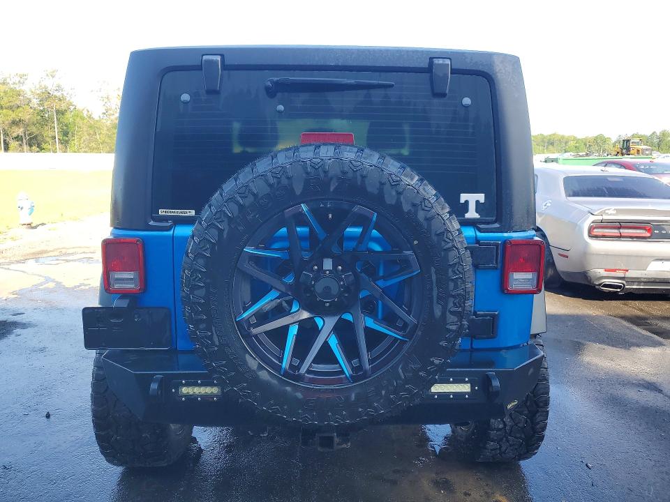 56990796 :رقم المزاد ، 1C4BJWCG0GL104451 vin ، 2016 Jeep Wrangler مزاد بيع