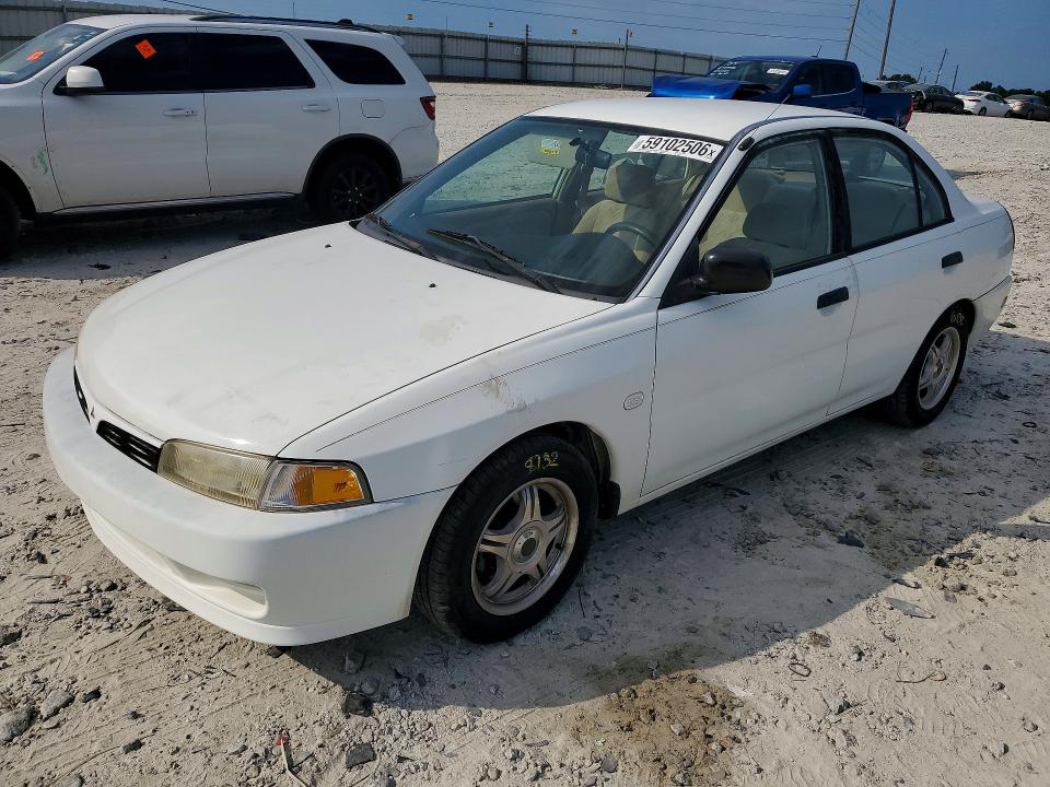 59102506 :رقم المزاد ، JA3AY26CX1U047815 vin ، 2001 Mitsubishi Mirage مزاد بيع