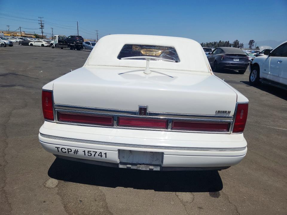 58934096 :رقم المزاد ، 1LNCM81F4LY774661 vin ، 1990 Lincoln Town Car مزاد بيع