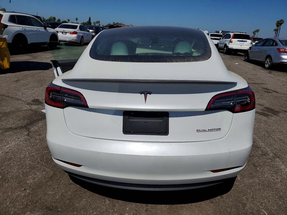 Продажа на аукционе авто 2021 Tesla Model 3, vin: 5YJ3E1EC0MF064182, номер лота: 56852706