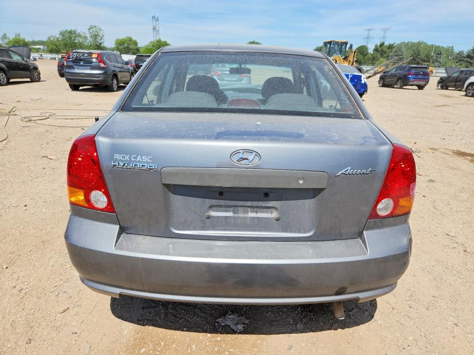 55887966 :رقم المزاد ، KMHCG45C04U572411 vin ، 2004 Hyundai Accent مزاد بيع