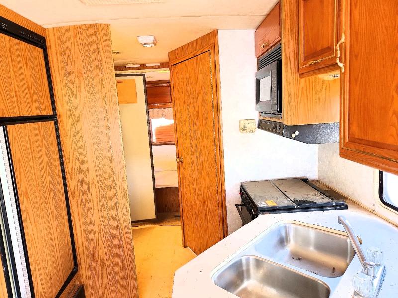 56644056 :رقم المزاد ، 3FCLF53GXTJA02231 vin ، 1996 Winnibago Recreational Vehicle (rv) مزاد بيع