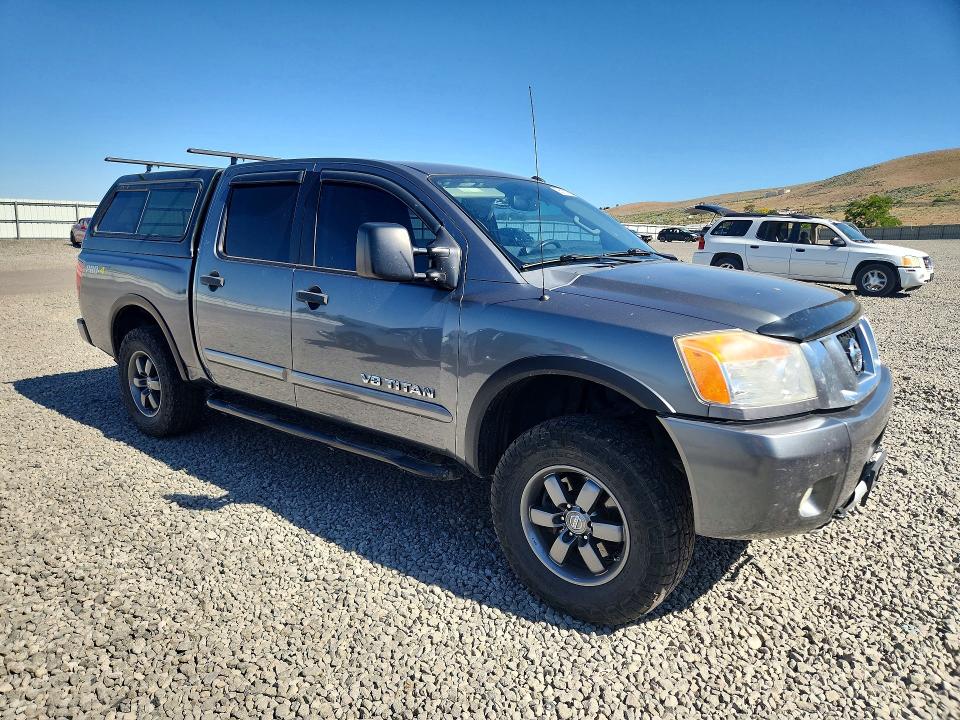 55170166 :رقم المزاد ، 1N6BA0EC9FN510090 vin ، 2015 Nissan Titan مزاد بيع