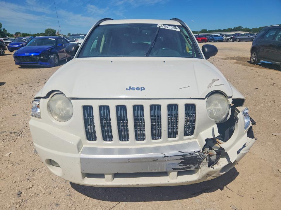 57085686 :رقم المزاد ، 1J4FF57B39D121571 vin ، 2009 Jeep Compass مزاد بيع