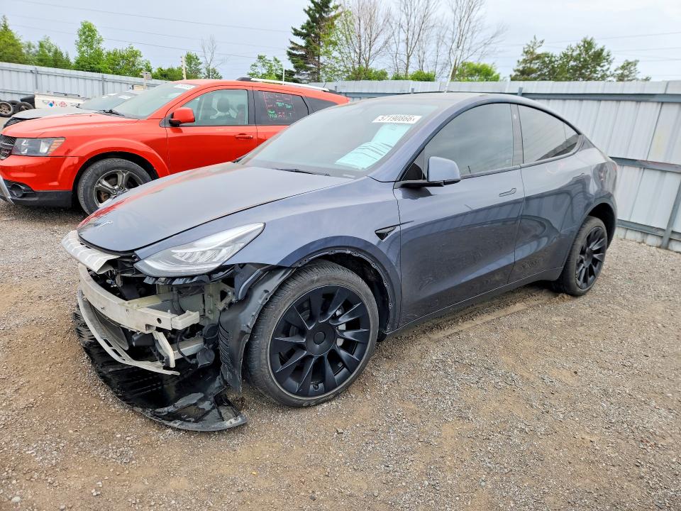 Auction sale of the 2022 Tesla Model Y, vin: 7SAYGDEE7NF574102, lot number: 57190866