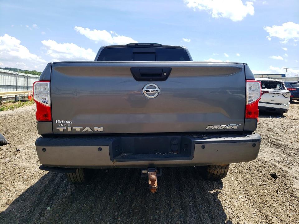 56796256 :رقم المزاد ، 1N6AA1E56KN503255 vin ، 2019 Nissan Titan مزاد بيع