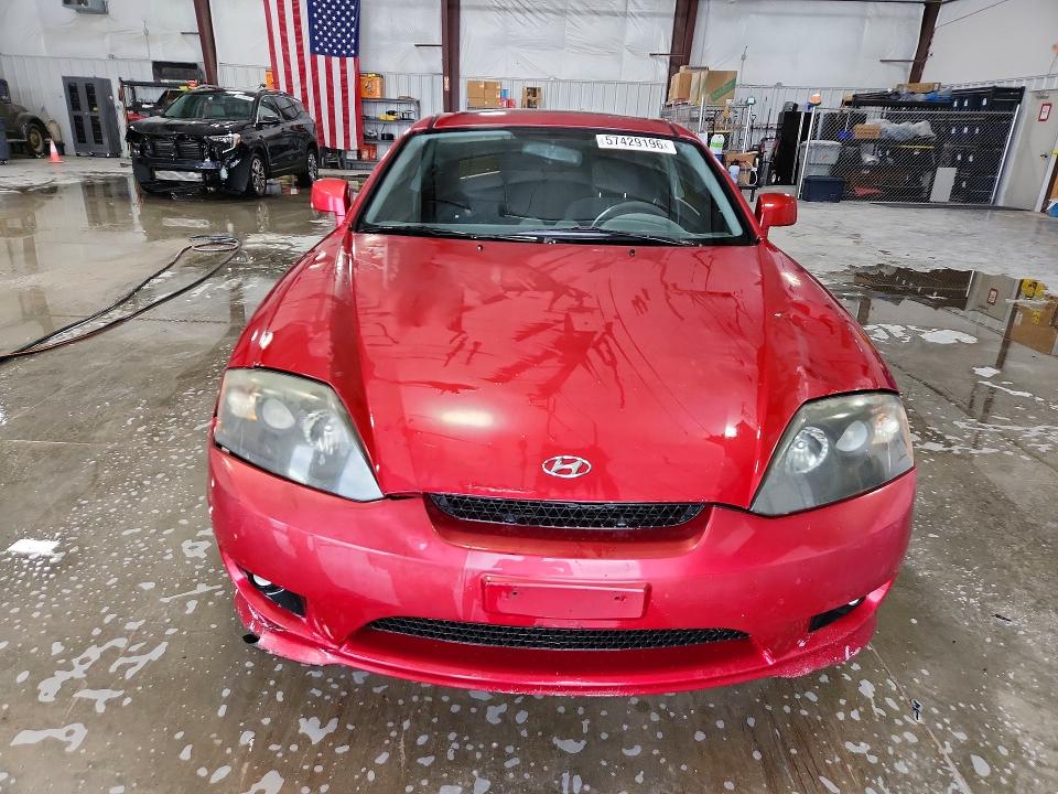 57429196 :رقم المزاد ، KMHHM65D26U211087 vin ، 2006 Hyundai Tiburon مزاد بيع