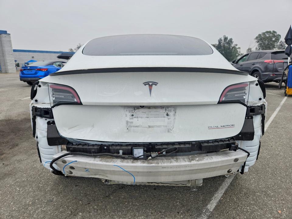 56862476 :رقم المزاد ، 5YJ3E1EC9MF077884 vin ، 2021 Tesla Model 3 مزاد بيع