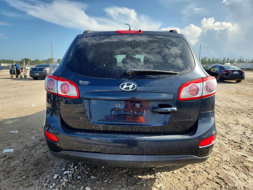59051836 :رقم المزاد ، 5XYZG4AG5BG017329 vin ، 2011 Hyundai Santa Fe مزاد بيع