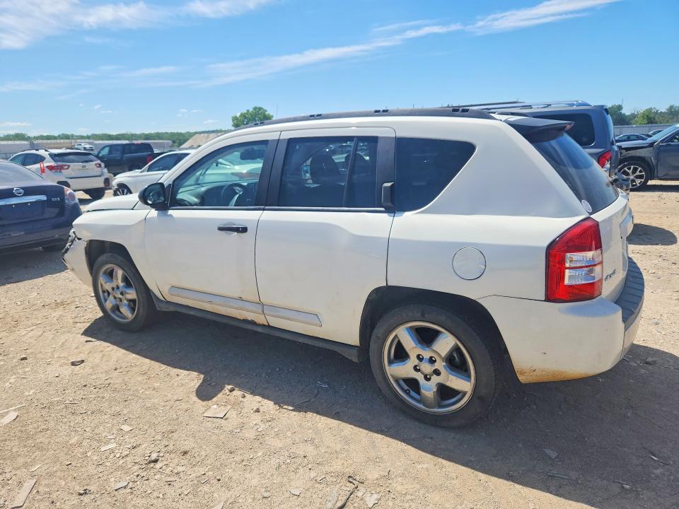 57085686 :رقم المزاد ، 1J4FF57B39D121571 vin ، 2009 Jeep Compass مزاد بيع