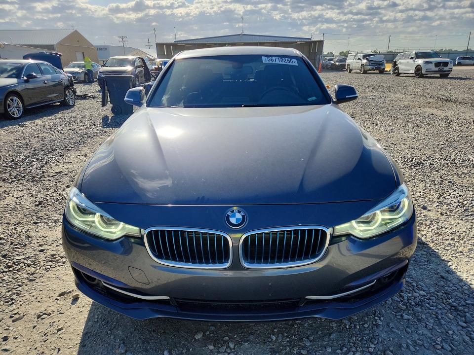 56718256 :رقم المزاد ، WBA8E1C51JA167509 vin ، 2018 Bmw 330e مزاد بيع