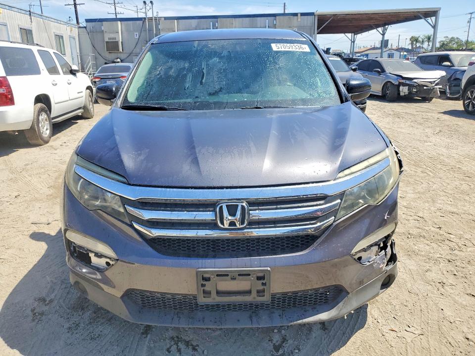 57059336 :رقم المزاد ، 5FNYF5H19JB014784 vin ، 2018 Honda Pilot مزاد بيع