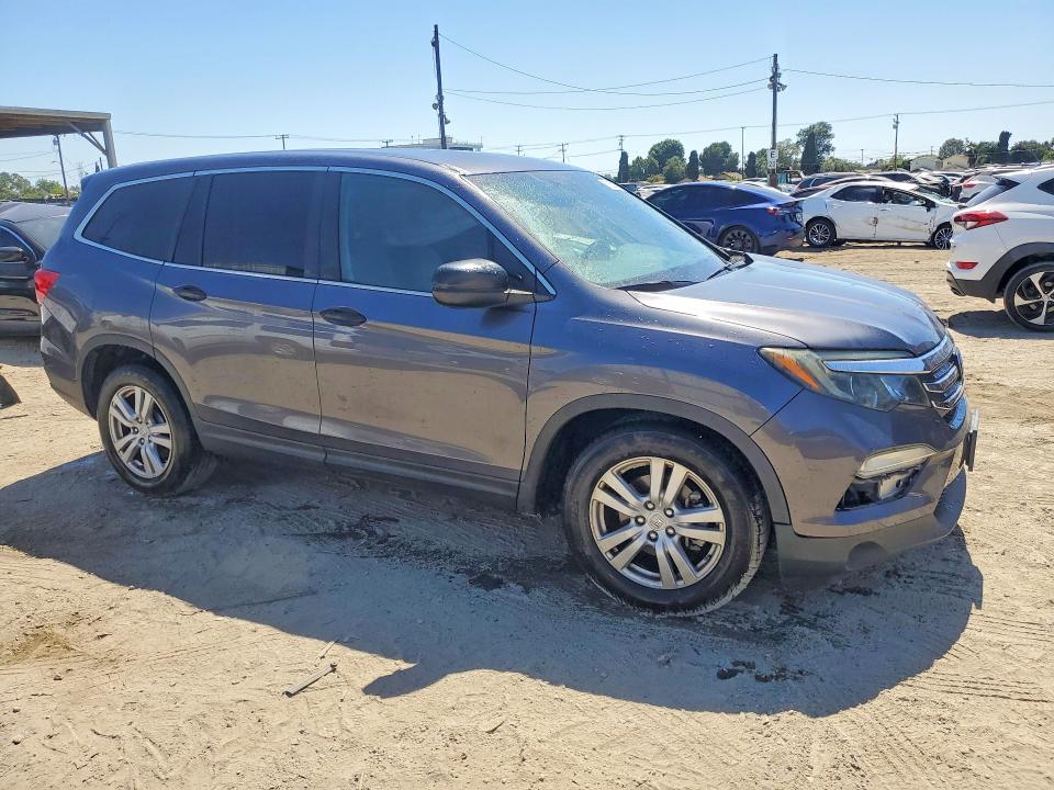 57059336 :رقم المزاد ، 5FNYF5H19JB014784 vin ، 2018 Honda Pilot مزاد بيع
