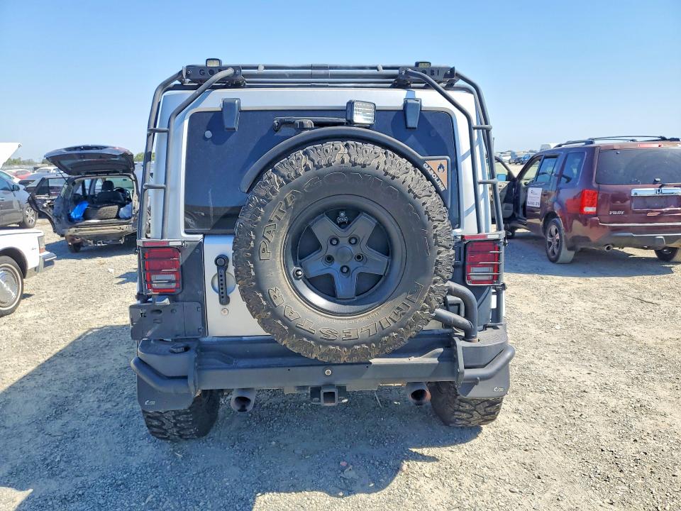 2011 Jeep Wrangler Unlimited მანქანა იყიდება აუქციონზე, vin: 1J4BA5H14BL547087, აუქციონის ნომერი: 57956626