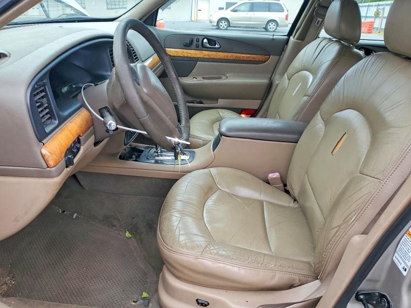 57655886 :رقم المزاد ، 1LNHM97V3XY715827 vin ، 1999 Lincoln Continental مزاد بيع