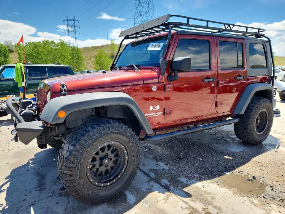 2009 Jeep Wrangler Unlimited მანქანა იყიდება აუქციონზე, vin: 1J4GA39129L746528, აუქციონის ნომერი: 56149696