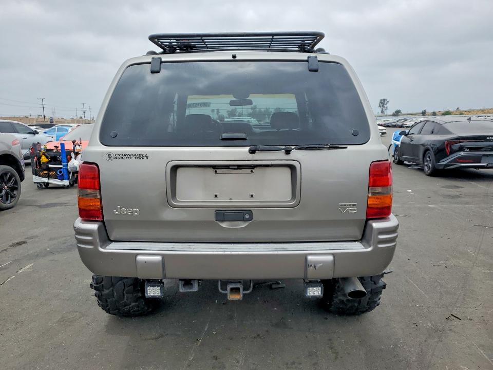 58076706 :رقم المزاد ، 1J4GZ88Z7WC297758 vin ، 1998 Jeep Grand Cherokee مزاد بيع