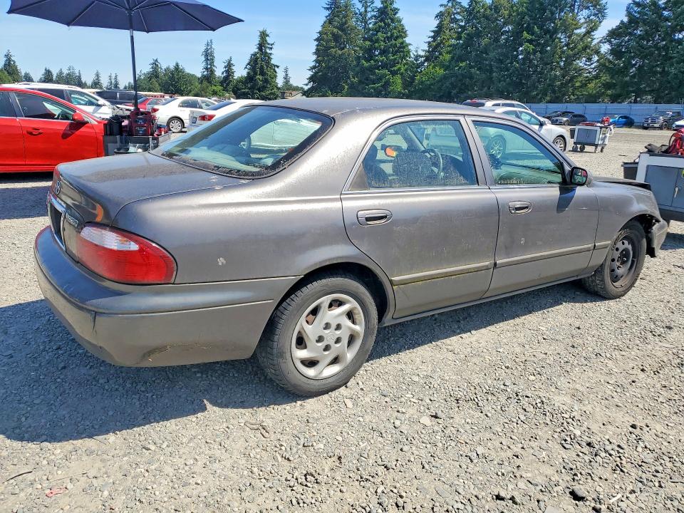 2001 Mazda 626 მანქანა იყიდება აუქციონზე, vin: 1YVGF22C315205083, აუქციონის ნომერი: 55456136
