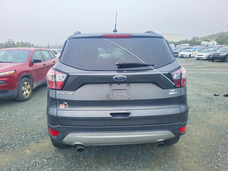 56808186 :رقم المزاد ، 1FMCU9GD6JUC97022 vin ، 2018 Ford Escape مزاد بيع