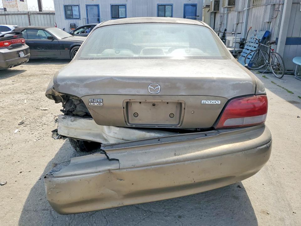 Продажа на аукционе авто 1999 Mazda 626, vin: 1YVGF22D3X5822551, номер лота: 56164196