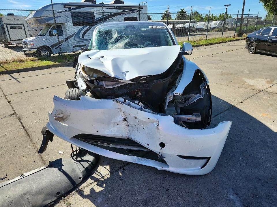 Продаж на аукціоні авто 2022 Tesla Model Y, vin: 7SAYGAEE3NF350811, номер лоту: 56677916