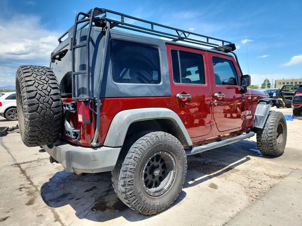 2009 Jeep Wrangler Unlimited მანქანა იყიდება აუქციონზე, vin: 1J4GA39129L746528, აუქციონის ნომერი: 56149696