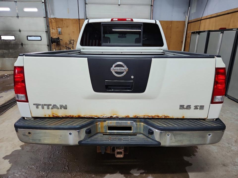 57263776 :رقم المزاد ، 1N6AA0EC2AN304324 vin ، 2010 Nissan Titan مزاد بيع
