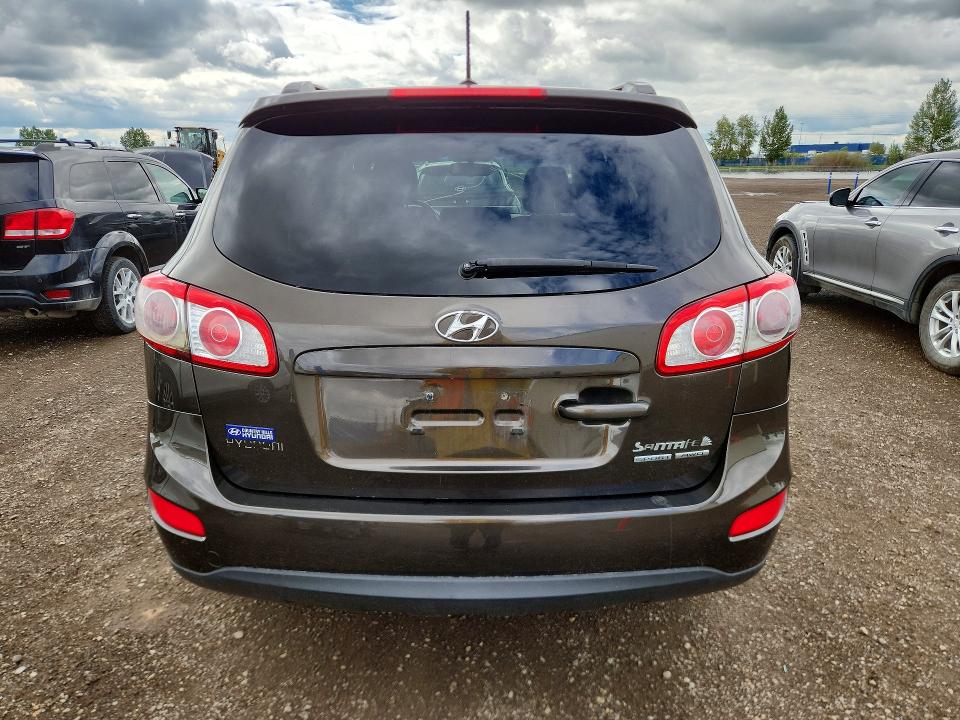 58095916 :رقم المزاد ، 5XYZGDAG3BG061801 vin ، 2011 Hyundai Santa Fe مزاد بيع