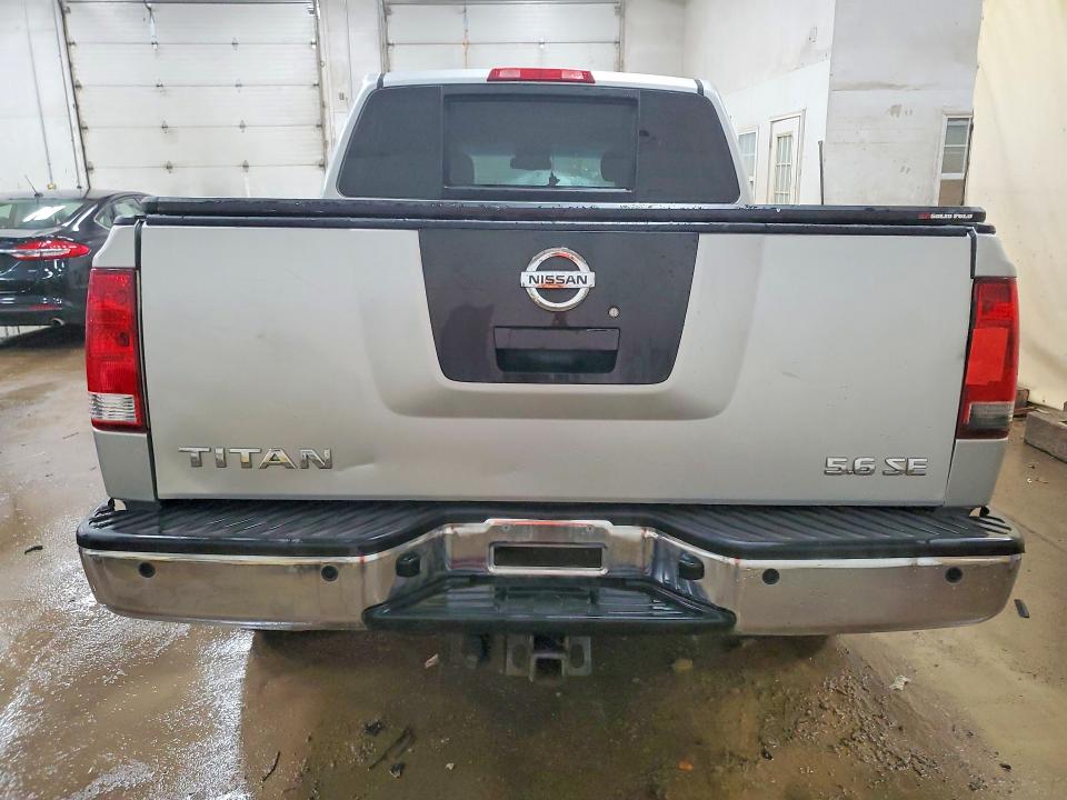 56186866 :رقم المزاد ، 1N6AA0EC4AN307676 vin ، 2010 Nissan Titan مزاد بيع