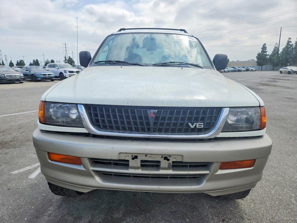 58152896 :رقم المزاد ، JA4LS41R4XP031744 vin ، 1999 Mitsubishi Montero مزاد بيع