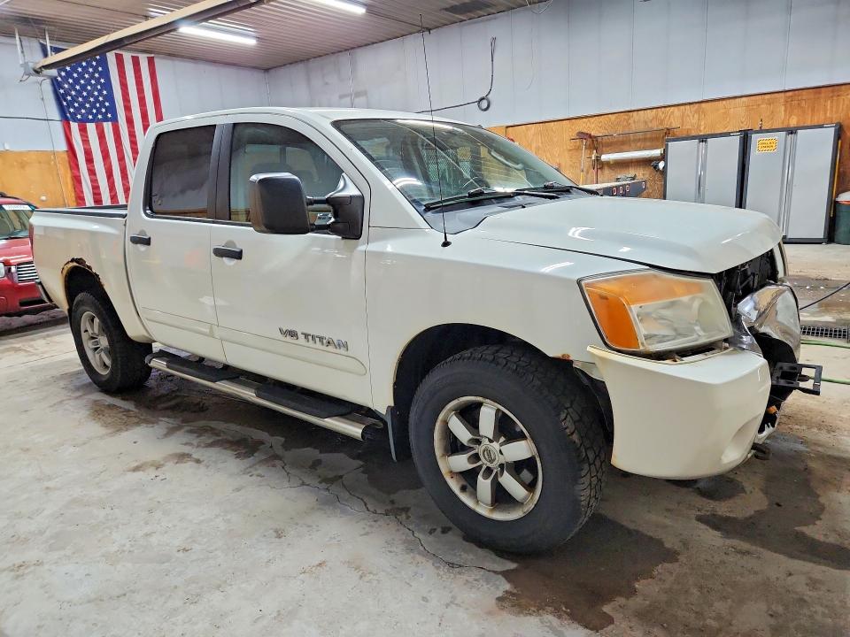 57263776 :رقم المزاد ، 1N6AA0EC2AN304324 vin ، 2010 Nissan Titan مزاد بيع