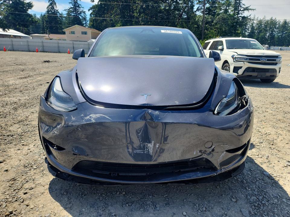Продаж на аукціоні авто 2023 Tesla Model  Y, vin: 7SAYGAEE6PF945252, номер лоту: 56189326