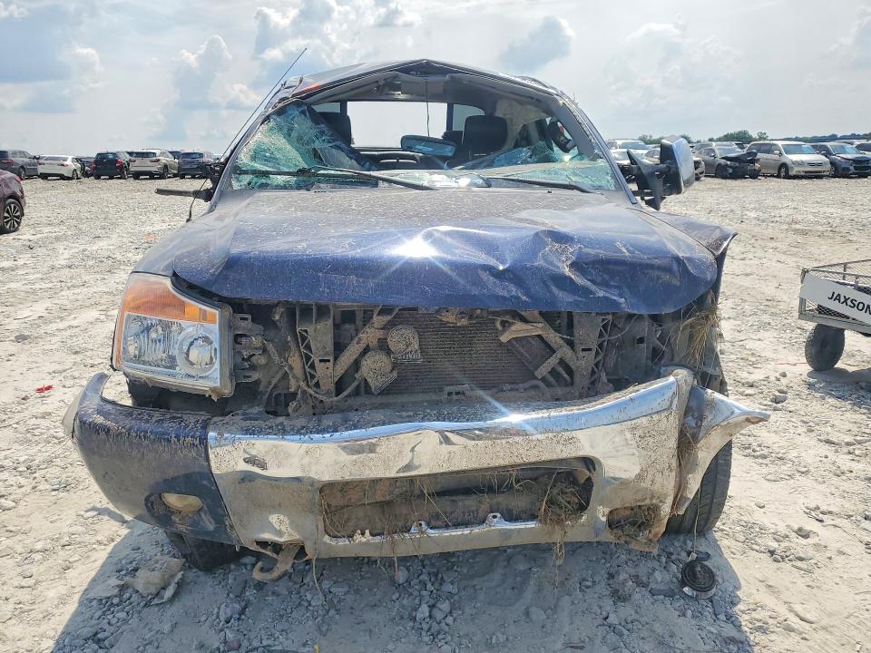 57300696 :رقم المزاد ، 1N6BA0ED8AN325448 vin ، 2010 Nissan Titan مزاد بيع