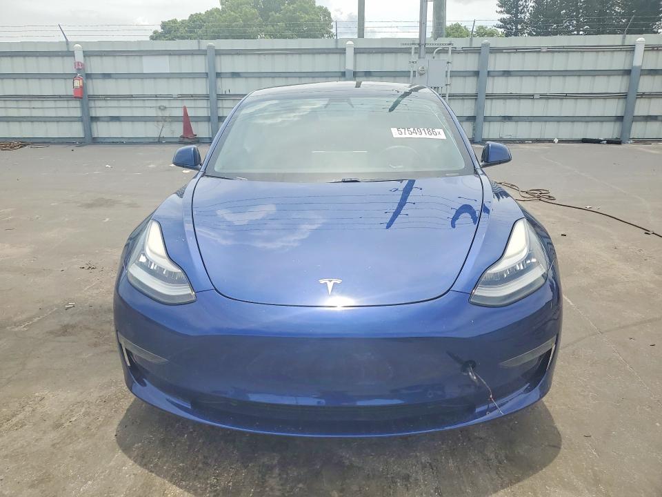 Продажа на аукционе авто 2021 Tesla Model 3, vin: 5YJ3E1EA1MF849910, номер лота: 57549186