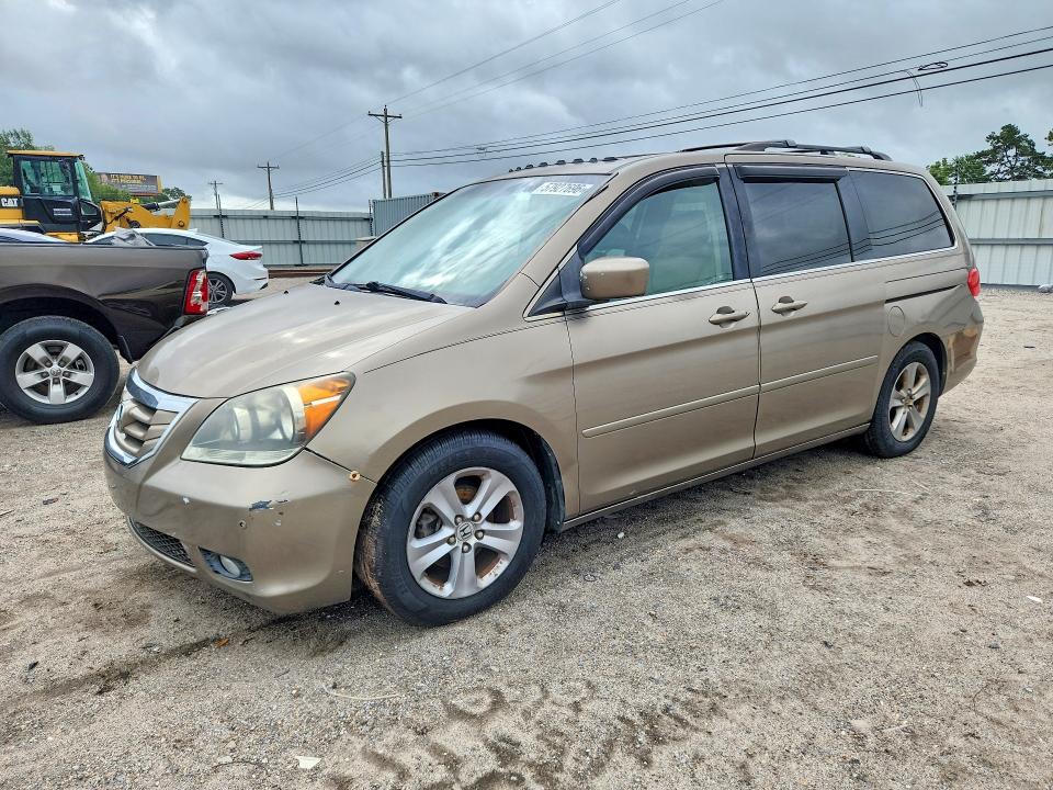 57927696 :رقم المزاد ، 5FNRL3H95AB004924 vin ، 2010 Honda Odyssey مزاد بيع