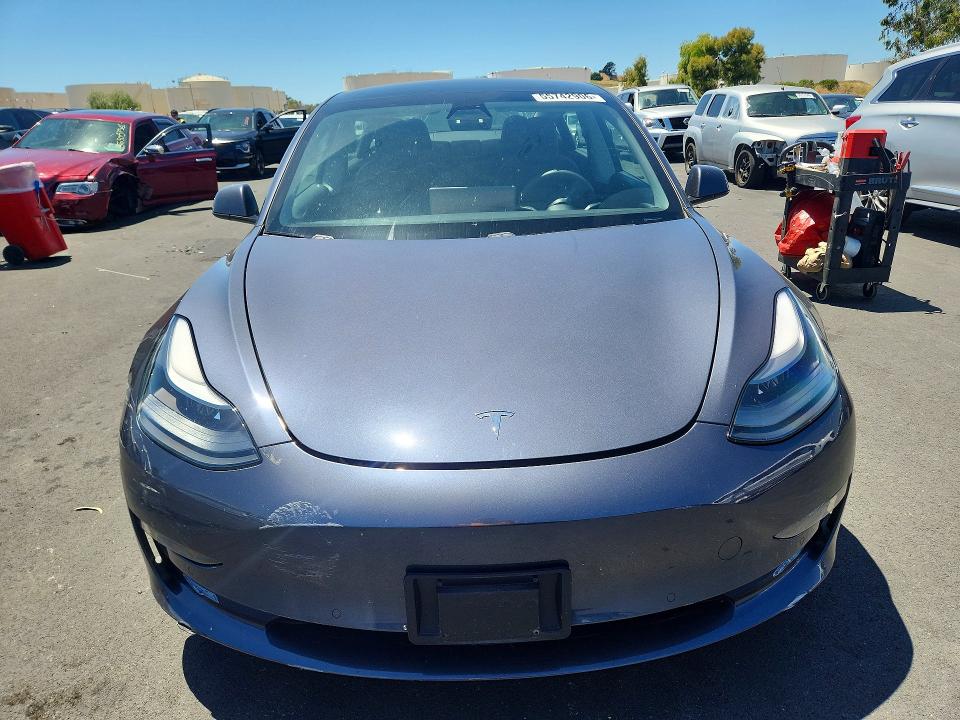 Продажа на аукционе авто 2021 Tesla Model 3, vin: 5YJ3E1EA1MF877786, номер лота: 55742906