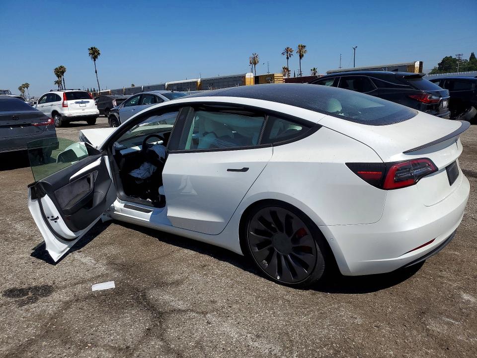 Продажа на аукционе авто 2021 Tesla Model 3, vin: 5YJ3E1EC0MF064182, номер лота: 56852706
