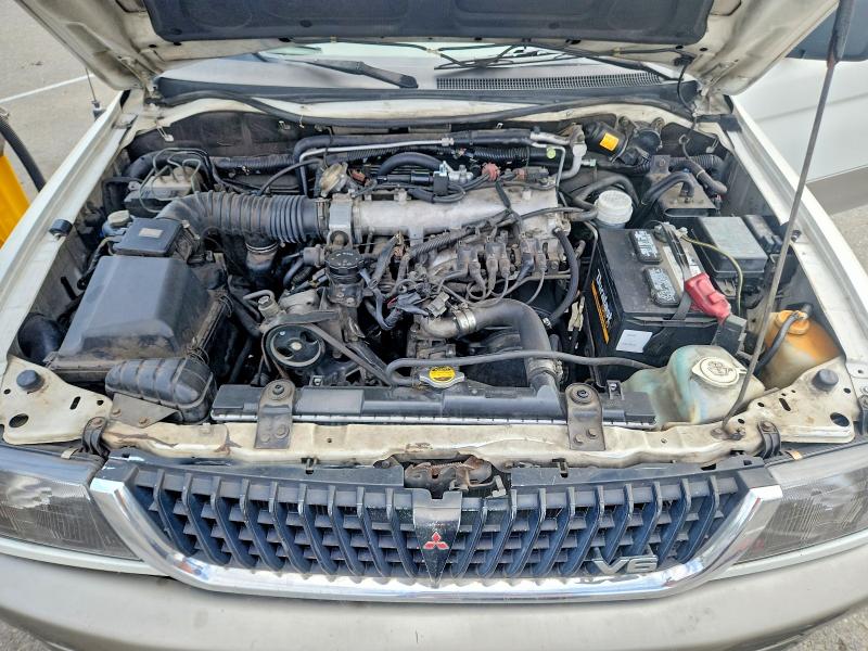 58152896 :رقم المزاد ، JA4LS41R4XP031744 vin ، 1999 Mitsubishi Montero مزاد بيع