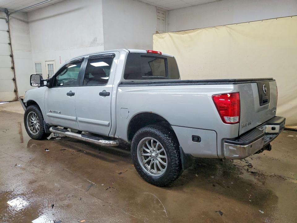 56186866 :رقم المزاد ، 1N6AA0EC4AN307676 vin ، 2010 Nissan Titan مزاد بيع