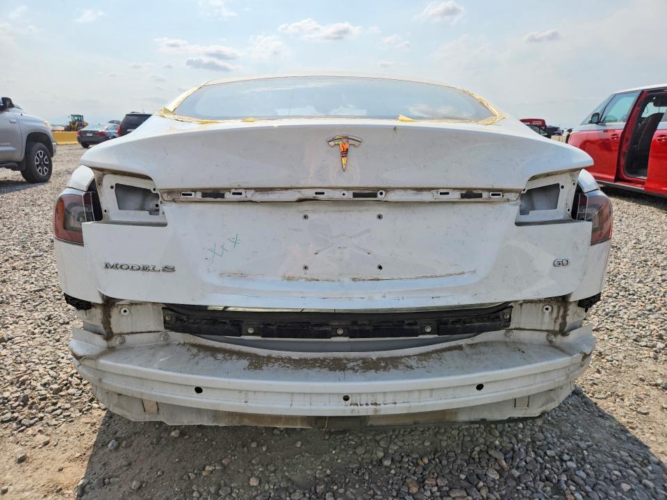 57266186 :رقم المزاد ، 5YJSA1S19EFP60860 vin ، 2014 Tesla Model S مزاد بيع