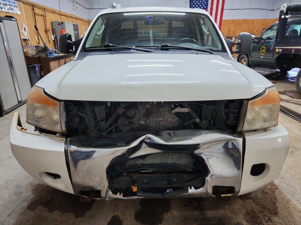 57263776 :رقم المزاد ، 1N6AA0EC2AN304324 vin ، 2010 Nissan Titan مزاد بيع