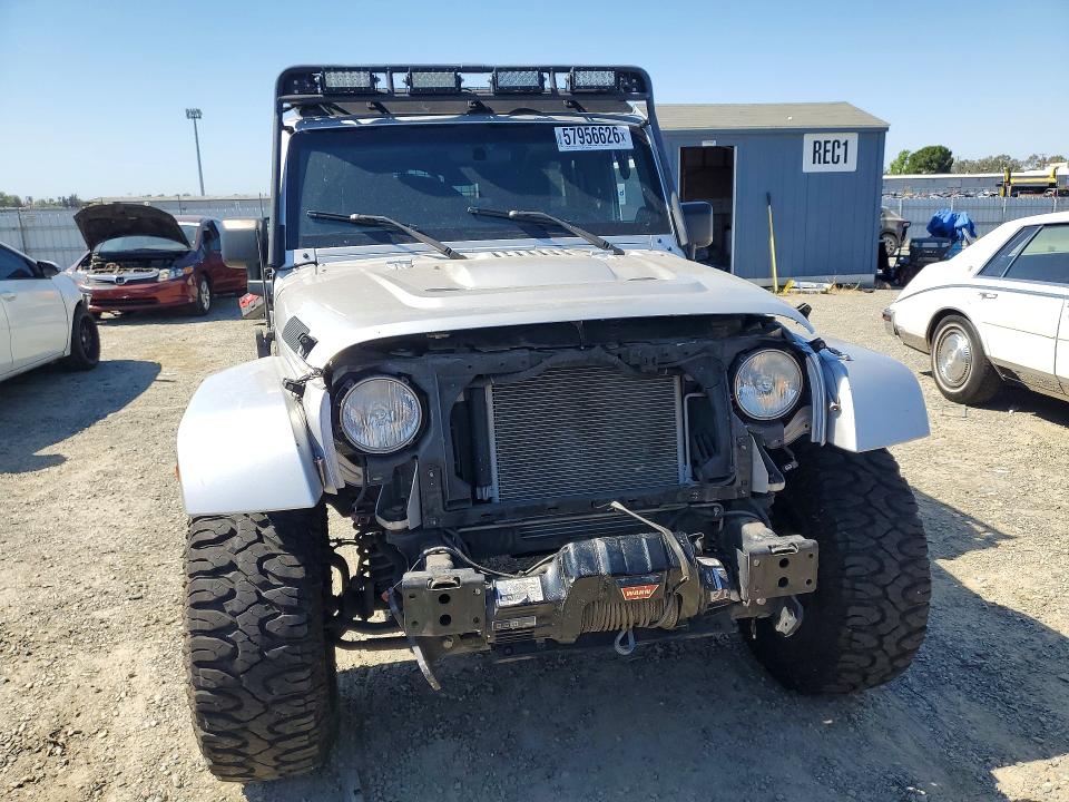 2011 Jeep Wrangler Unlimited მანქანა იყიდება აუქციონზე, vin: 1J4BA5H14BL547087, აუქციონის ნომერი: 57956626