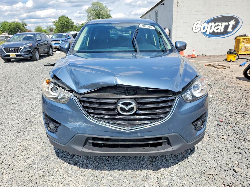 57080046 :رقم المزاد ، JM3KE4CY8G0698989 vin ، 2016 Mazda Cx-5 مزاد بيع