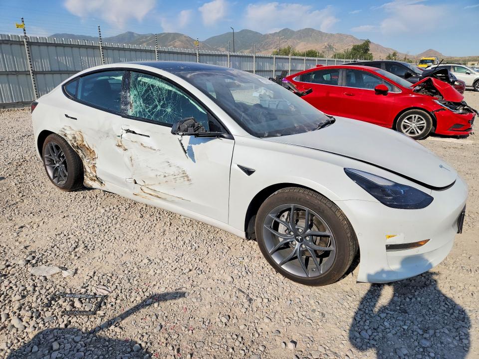 Продажа на аукционе авто 2022 Tesla Model 3, vin: 5YJ3E1EB8NF142815, номер лота: 57850066
