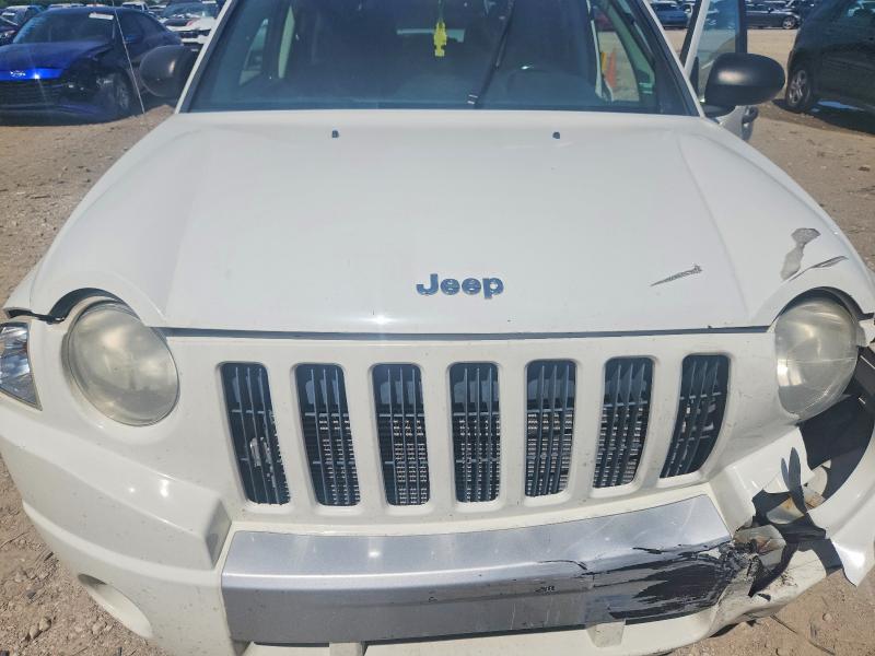 57085686 :رقم المزاد ، 1J4FF57B39D121571 vin ، 2009 Jeep Compass مزاد بيع
