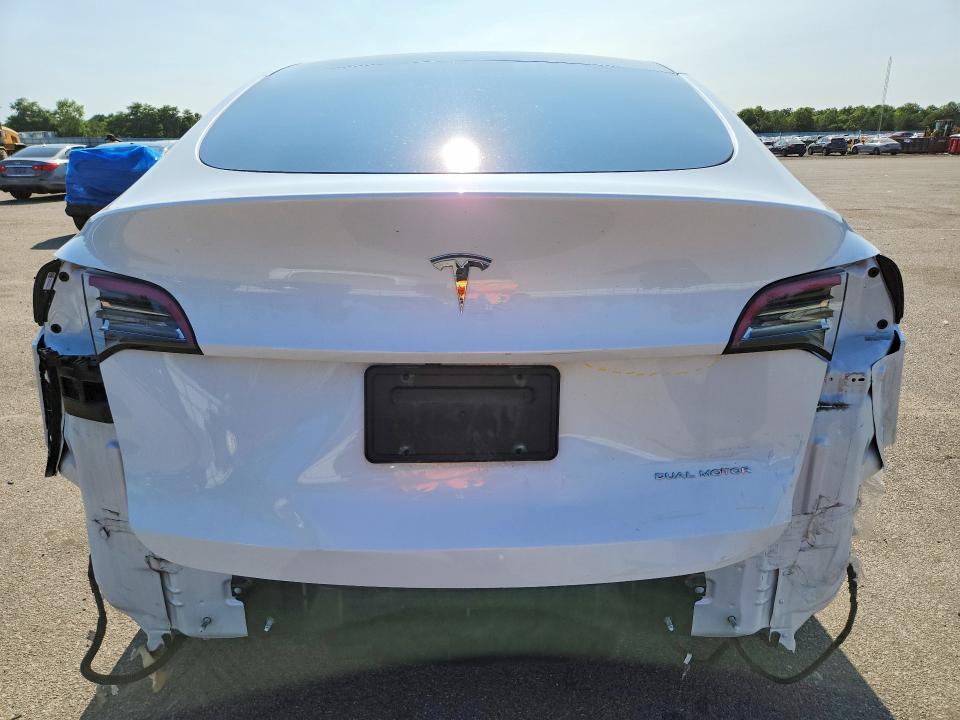 60703316 :رقم المزاد ، 5YJYGDEE1MF130855 vin ، 2021 Tesla Model Y مزاد بيع
